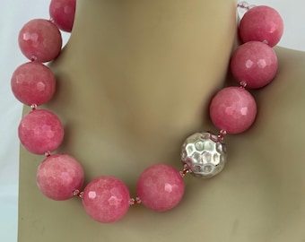 Pink Jade Necklace handknotted in silk thread, 26mm faceted dyed pink jade, 24 mm dented sterling silver ball with sterling silver findings.