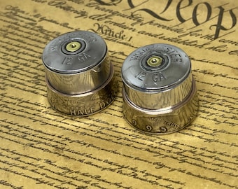 Winchester 12 gauge shotgun shell with Kennedy half dollar guitar knob. Read full description.