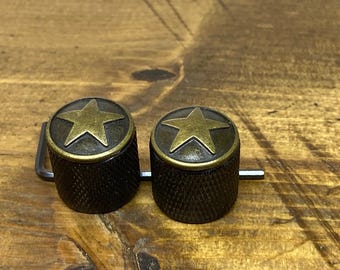 Black knurled brass Star knobs. Read full description.
