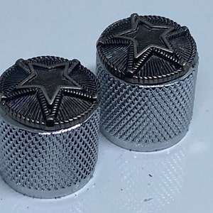 Double Star guitar knobs with knurled sides.