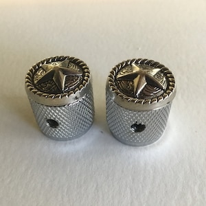 A set of two Star knobs with knurled sides.