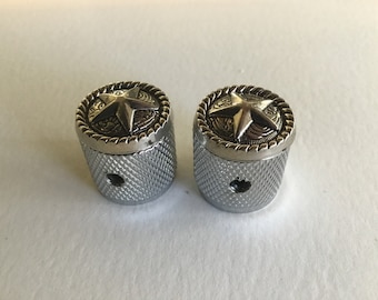 A set of two Star knobs with knurled sides.