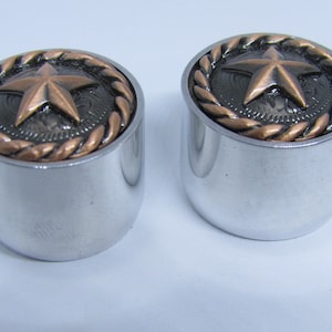 Star guitar knobs with aluminun sides.