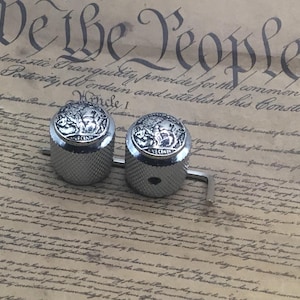 Räfflade gitarrknoppar i buffalo nickel.