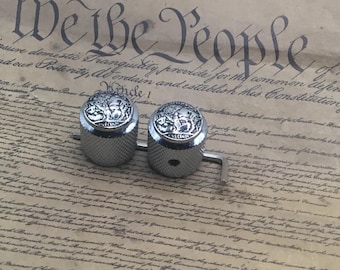 Knurled buffalo nickel guitar knobs.