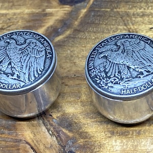 Flying eagle domed guitar knobs.