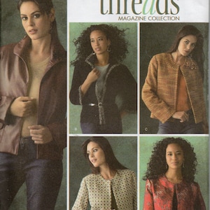 May include: Simplicity sewing pattern featuring various jacket designs. The image showcases different jacket styles, including a brown leather-look jacket, a black jacket with silver trim, and a patterned jacket. The pattern includes the text "threads MAGAZINE COLLECTION".