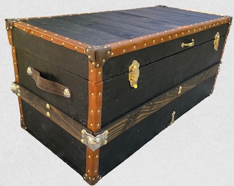Baú de viagem artesanal com acabamento em ébano