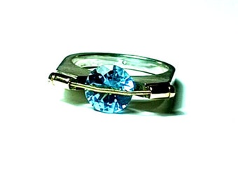 Sterling Silver & 14kt Gold Tension Set Blue Topaz Ring by Tomasz Plodowski