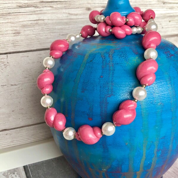 Plastic vintage pink necklace.