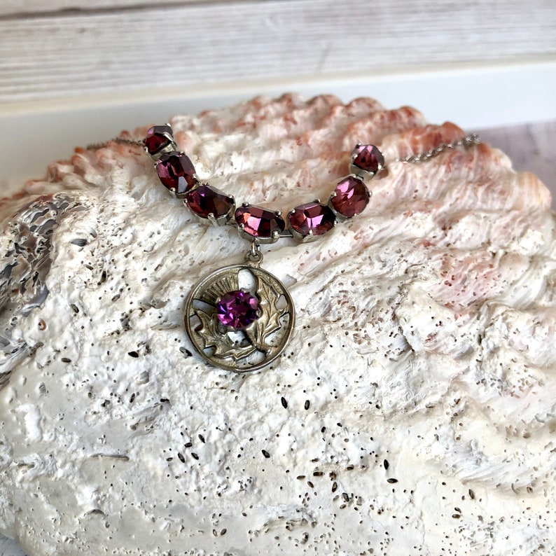 Silver tone /& amethyst colour necklace.