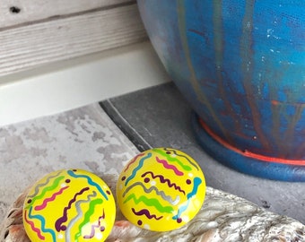 Vintage yellow plastic earrings.