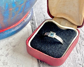 White gold square blue stone ring