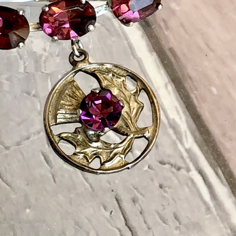 Silver tone /& amethyst colour necklace.