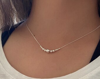 Simplicity with Style: Sterling Silver Necklace with 13 Beads in Various Sizes - Perfect for Everyday and Special Occasions.