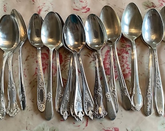 Assortment of 25 vintage serving spoons