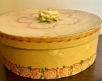 Vintage Hatbox with millinery flower accent on top