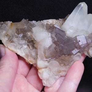 Pretty purplish fluorite with calcite from Pakistan