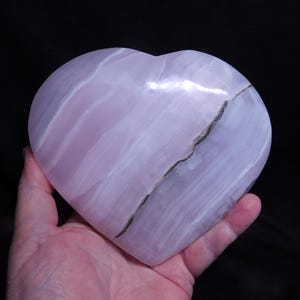 Very large UV reactive smoky pink mangano calcite heart 2 1/4 lbs.