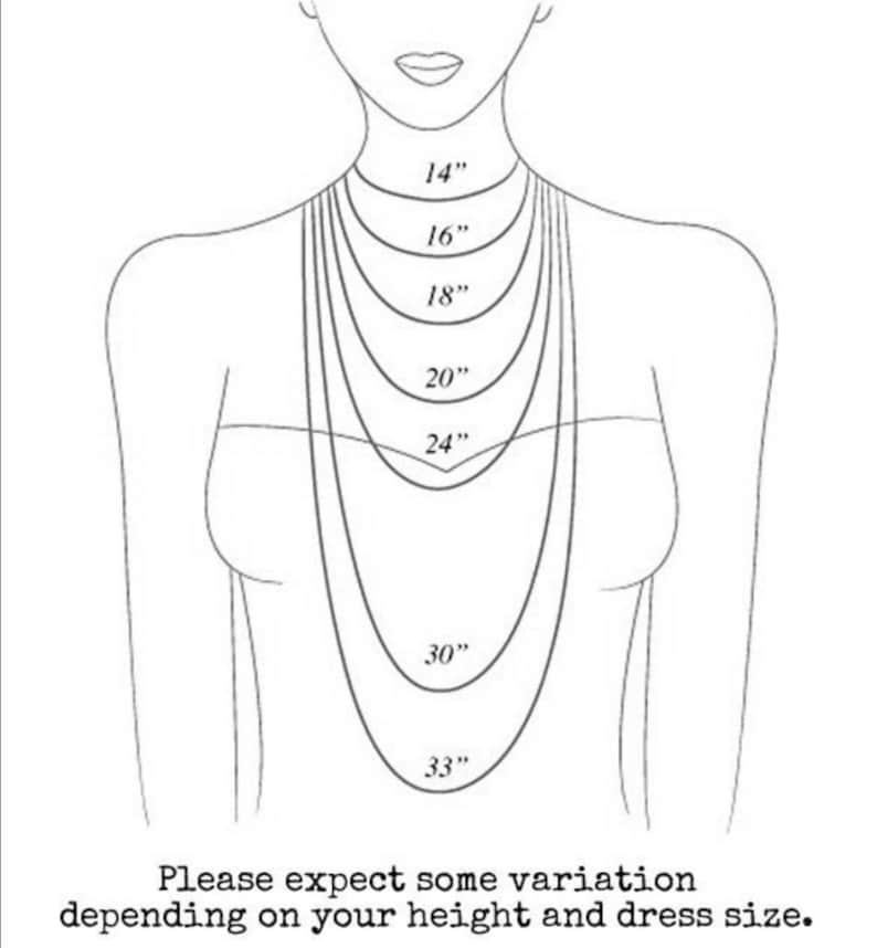 May include: A line drawing of a woman's torso with a series of necklaces of different lengths, labeled with measurements in inches: 14", 16", 18", 20", 24", 30", and 33". The text "Please expect some variation depending on your height and dress size." is below the image.