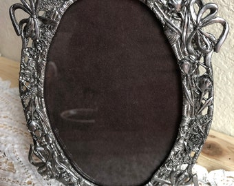 An Ornate Decorative Somewhat Heavy Metal/Pewter Oval Table Top Frame With A Floral Ribbon Design Marked Metzke 1990 See Description