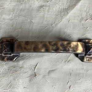 A Set Of FIVE Decorative Drawer Pulls With A Hammered/Medieval Look Marked Japan See Description