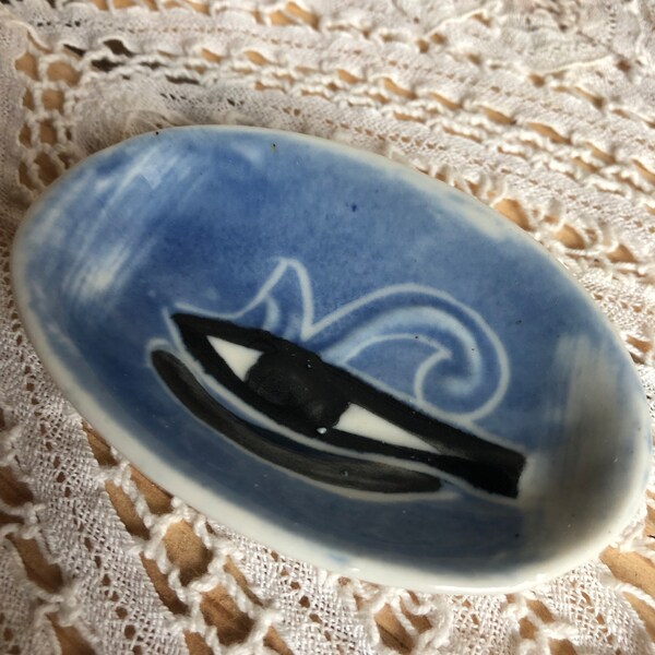 A Small/Miniature Shallow Oval Ceramic Ring Dish With The Painted Design Of An Egyptian Eye See Description