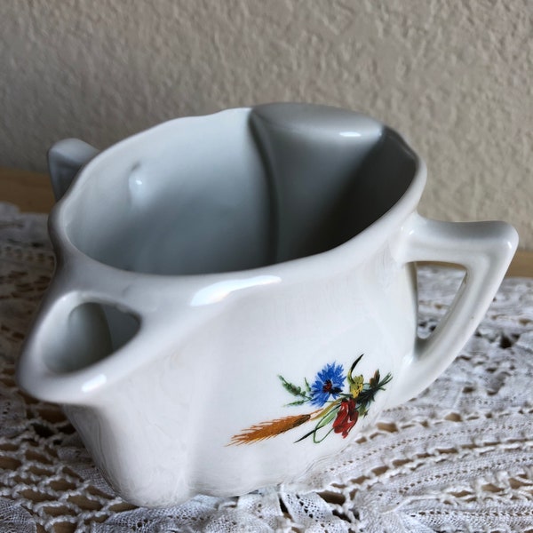 A White Ceramic/Porcelain Gravy Separator With A Floral Design Stamped Made In France For HOAN See Description