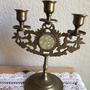 A Table Top Rustic Candelabra With An Asian Theme Marked China See Description