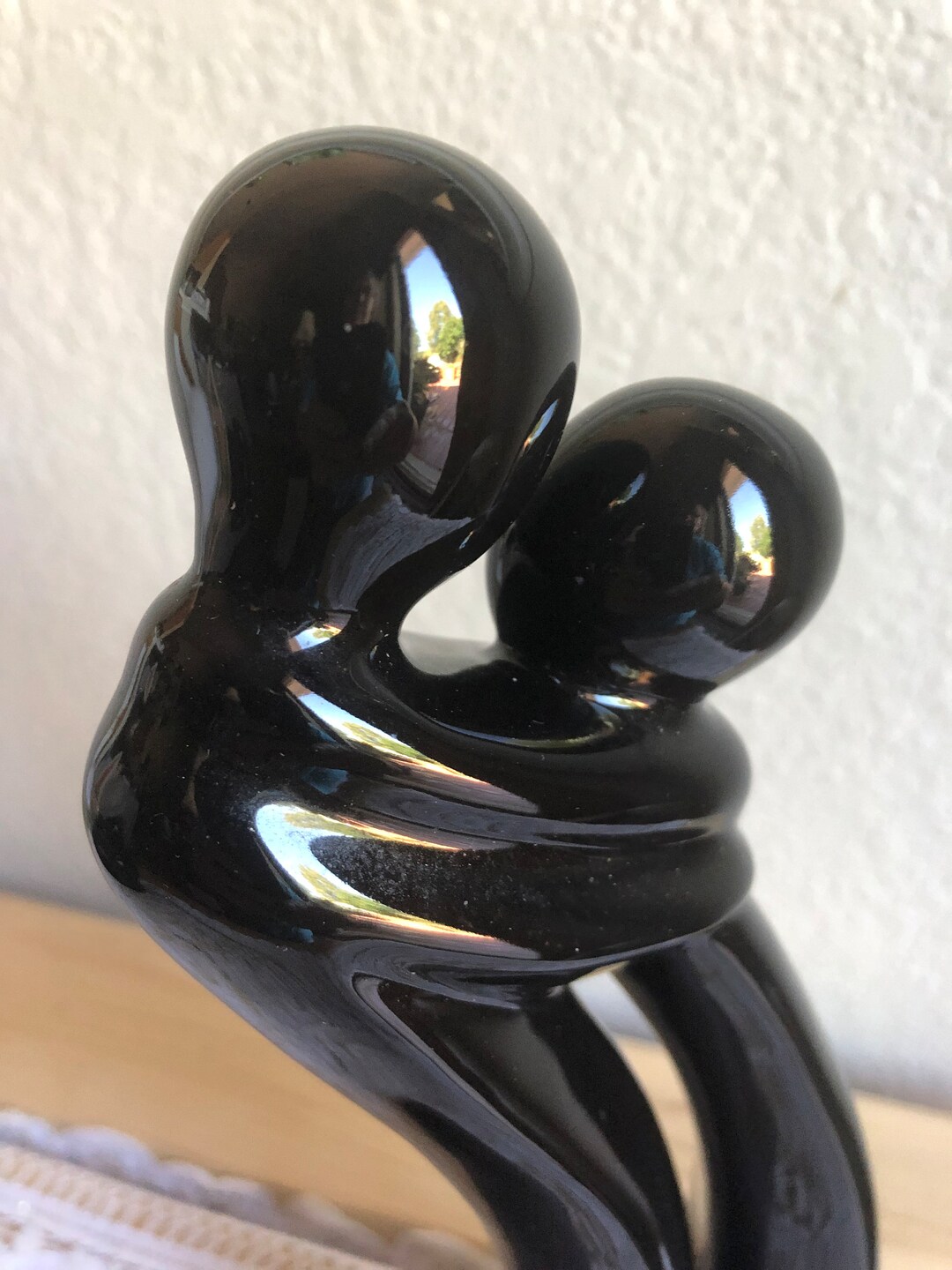 A Black Porcelain Figurine of A Loving Couple With Sticker Etsy