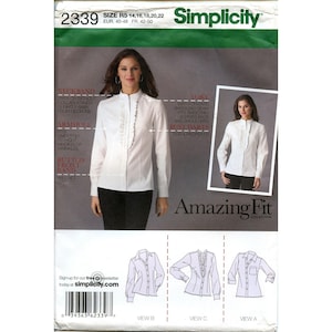 May include: Simplicity pattern 2339 for a white blouse with a ruffled front. Sizes 14-22 are included. The pattern features a neckband, armhole, and button front band. The Amazing Fit Collection pattern includes views A, B, and C.