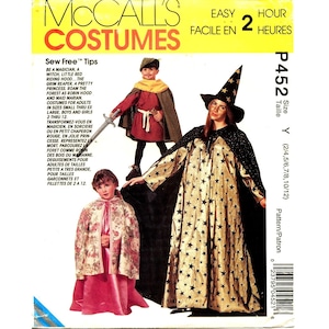 Pode incluir: Padrão de costura para um traje de bruxa, um cavaleiro e um capuz vermelho. O padrão chama-se McCall's Costumes e o número do padrão é P452. O padrão é para os tamanhos 2-12 e inclui instruções para fazer os trajes.