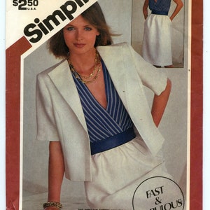 May include: A sewing pattern for a white jacket and a blue and white striped top with a white skirt. The pattern is from Simplicity and is size N (10, 12, and 14). The pattern is labeled "Fast & Fabulous".