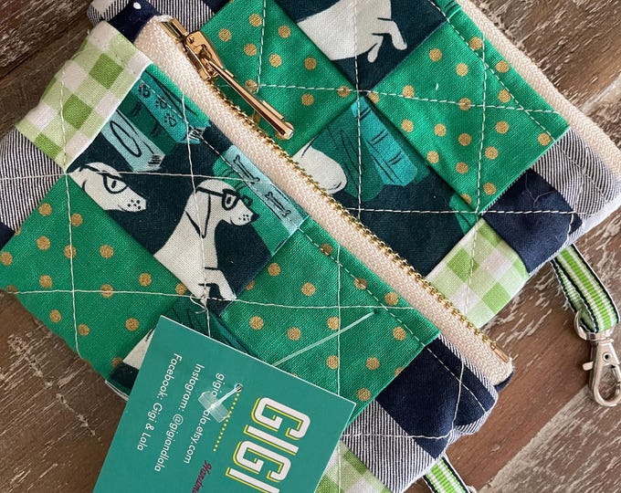 Quilted card pouch with clip attached
