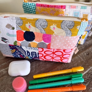 Handmade quilted zipper pouch; various patterns available, all unique