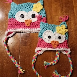 Owl kids hat. Baby, Newborn, Infant, Toddler Sized  Crochet Adorable Owl Hat. Turquoise, pink, and yellow horned owl hat with braids.