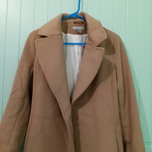 Sold at Auction: HERMÈS Trench-coat réversible en laine et coton