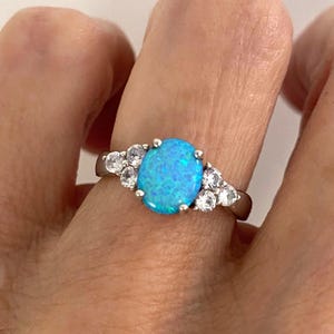 Blue Lab Created Opal Ring: Sterling Silver with CZ Side Stones