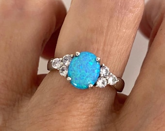Blue Opal Ring: Sterling Silver with CZ Side Stones