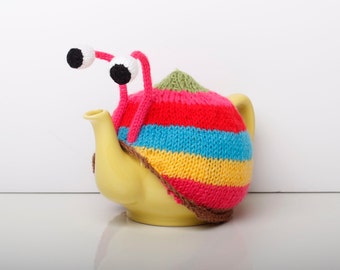 Knitted pink stripy snail tea cosy. Tea lovers gift.