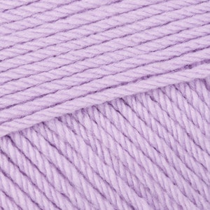 May include: Close-up of a soft, lavender-colored yarn. The yarn is made of a single strand and has a slightly textured surface.
