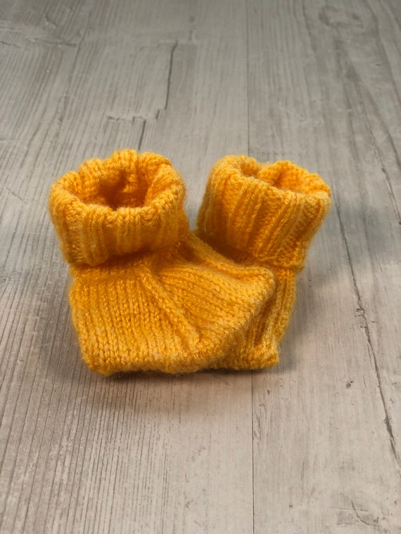 Duck feet baby booties hand knitted by Ruperts House.