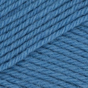May include: Close-up of a skein of blue yarn. The yarn is soft and fluffy, and it has a slightly textured surface.