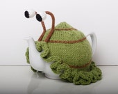 Green snail tea cosy with frilly bottom. Gift for tea lovers. Garden lovers gift