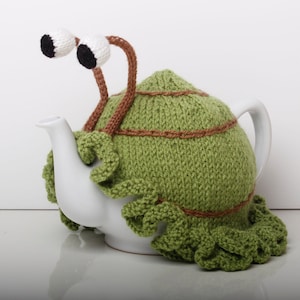 Green snail tea cosy with frilly bottom. Gift for tea lovers. Garden lovers gift