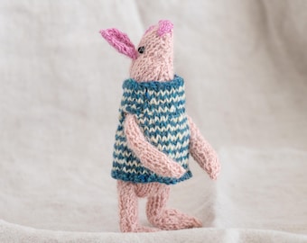 Hand-Knitted Piglet Toy with Poseable Limbs