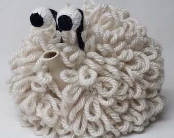 Dolly the Sheep hand knitted woolly tea cosy.