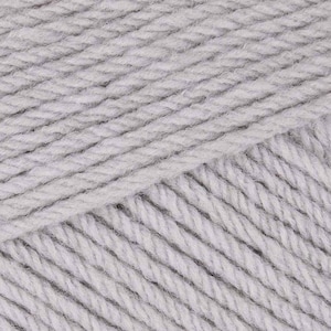 May include: A skein of light gray yarn with a soft, fuzzy texture.