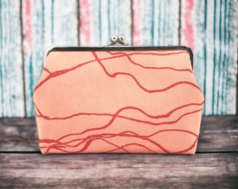 apricot-colored clip purse, iron-on bag