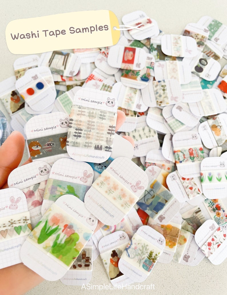 May include: A collection of washi tape samples with various designs, including floral, geometric, and illustrated patterns. The samples are displayed on small, white cards with the text "Mini sample" and "Washi Tape Samples".